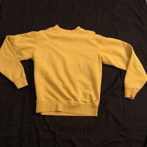 Plain yellowish crew neck worn once